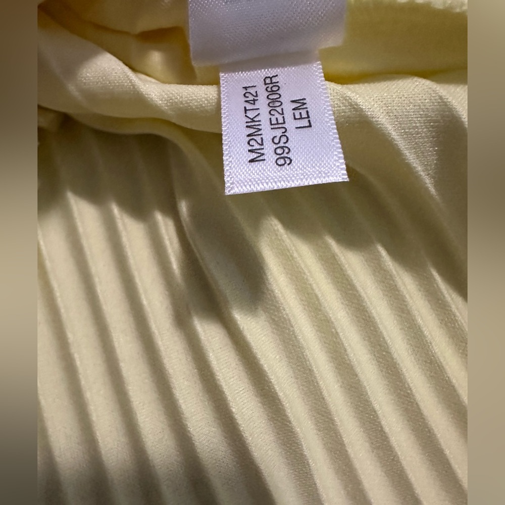 Marc New York. Andrew Marc High Neck Lemon Meringue Yellow Top. NWT!
Size: M - Picture 9 of 15